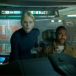 Charlize Theron and Idris Elba on the bridge of the ship Prometheus.